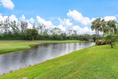 Shimmering lake and golf course views from this luxurious 3 on Quail Ridge Golf Course and Country Club in Florida - for sale on GolfHomes.com, golf home, golf lot