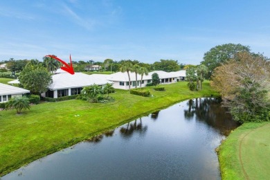 Shimmering lake and golf course views from this luxurious 3 on Quail Ridge Golf Course and Country Club in Florida - for sale on GolfHomes.com, golf home, golf lot