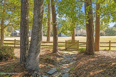 Unique architecture highlights this irresistible one-level home on Brandywine Bay Golf Club in North Carolina - for sale on GolfHomes.com, golf home, golf lot