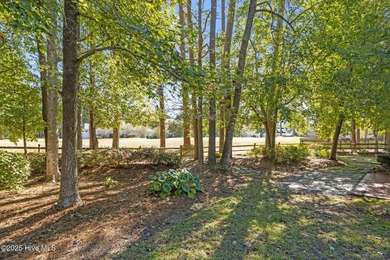 Unique architecture highlights this irresistible one-level home on Brandywine Bay Golf Club in North Carolina - for sale on GolfHomes.com, golf home, golf lot