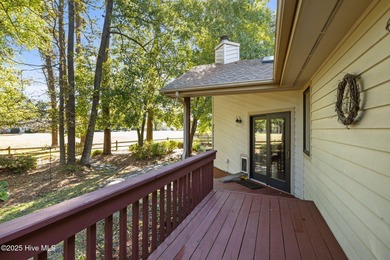 Unique architecture highlights this irresistible one-level home on Brandywine Bay Golf Club in North Carolina - for sale on GolfHomes.com, golf home, golf lot