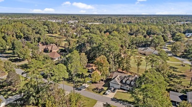 Unique architecture highlights this irresistible one-level home on Brandywine Bay Golf Club in North Carolina - for sale on GolfHomes.com, golf home, golf lot