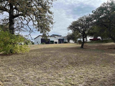 Welcome to the pinnacle of luxury living on Applehead Island in on Apple Rock Golf Course - Horseshoe Bay in Texas - for sale on GolfHomes.com, golf home, golf lot