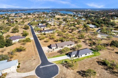 Discover the perfect blend of modern comfort and resort-style on Apple Rock Golf Course - Horseshoe Bay in Texas - for sale on GolfHomes.com, golf home, golf lot