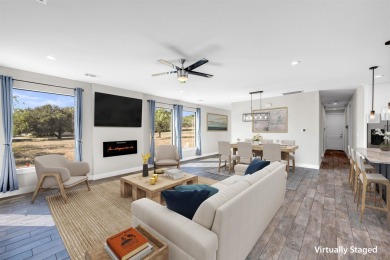 Discover the perfect blend of modern comfort and resort-style on Apple Rock Golf Course - Horseshoe Bay in Texas - for sale on GolfHomes.com, golf home, golf lot