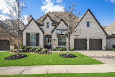 LAKE VIEW Highland built SINGLE STORY home is located in highly on The Tribute At the Colony in Texas - for sale on GolfHomes.com, golf home, golf lot