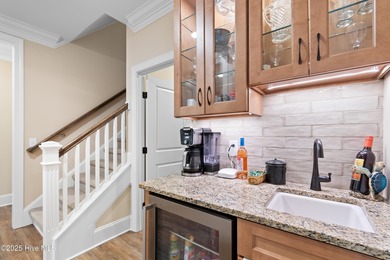 This stunning, custom-built home by Douglas Builders is ready on Ocean Ridge Plantation in North Carolina - for sale on GolfHomes.com, golf home, golf lot