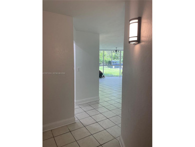 Beautifully updated apartment offering true peace of mind and on Country Club of Miami in Florida - for sale on GolfHomes.com, golf home, golf lot