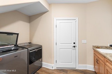 This stunning, custom-built home by Douglas Builders is ready on Ocean Ridge Plantation in North Carolina - for sale on GolfHomes.com, golf home, golf lot