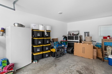 This stunning, custom-built home by Douglas Builders is ready on Ocean Ridge Plantation in North Carolina - for sale on GolfHomes.com, golf home, golf lot