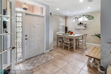 This rarely available and spacious 2 bedroom, 2 bathroom first on TPC Eagle Trace in Florida - for sale on GolfHomes.com, golf home, golf lot