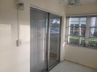 1st Floor Move in Ready Condo with Glass Enclosed Florida Room on Kings Point Golf -Flanders Way in Florida - for sale on GolfHomes.com, golf home, golf lot