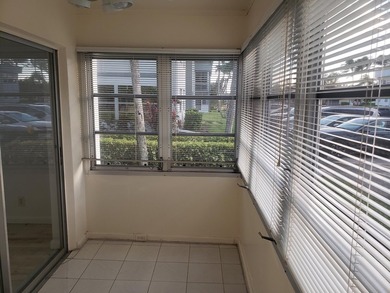 1st Floor Move in Ready Condo with Glass Enclosed Florida Room on Kings Point Golf -Flanders Way in Florida - for sale on GolfHomes.com, golf home, golf lot