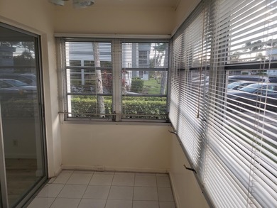 1st Floor Move in Ready Condo with Glass Enclosed Florida Room on Kings Point Golf -Flanders Way in Florida - for sale on GolfHomes.com, golf home, golf lot