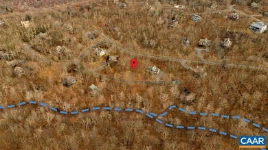 Located on a quiet cul de sac this beautifully wooded, gently on Devils Knob in Virginia - for sale on GolfHomes.com, golf home, golf lot