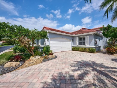Welcome to this beautifully maintained 3-bedroom, 2.5-bathroom on Wycliffe Golf and Country Club in Florida - for sale on GolfHomes.com, golf home, golf lot