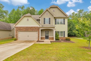 Welcome to this beautifully maintained 4 bedroom, 3 bathroom on Mirror Lake Golf Club in Georgia - for sale on GolfHomes.com, golf home, golf lot