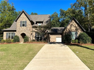 Welcome to this stunning 5 bedroom, 4 bathroom home nestled in on The Auburn University Club in Alabama - for sale on GolfHomes.com, golf home, golf lot