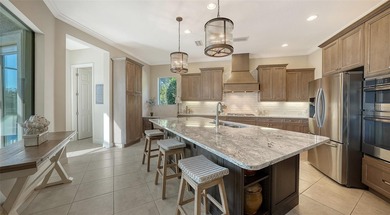 Privately positioned on an oversized homesite within the gated on Ritz-Carlton Members Golf Club in Florida - for sale on GolfHomes.com, golf home, golf lot