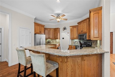 Discover the perfect mix of comfort, space, and country charm in on Fayetteville Country Club in Arkansas - for sale on GolfHomes.com, golf home, golf lot