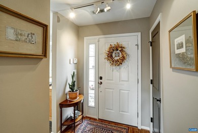 Privately situated townhouse at the edge of RiverRun, adjacent on Meadowcreek Golf Course in Virginia - for sale on GolfHomes.com, golf home, golf lot