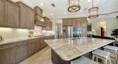 Privately positioned on an oversized homesite within the gated on Ritz-Carlton Members Golf Club in Florida - for sale on GolfHomes.com, golf home, golf lot