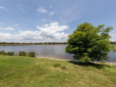 Experience casual lakefront luxury in this stunning residence on Boca Royale Golf and Country Club in Florida - for sale on GolfHomes.com, golf home, golf lot