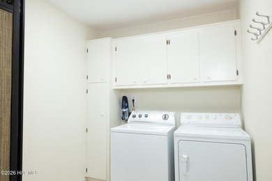 Located in the sought-after Lockwood Folly community, this on Lockwood Folly Country Club in North Carolina - for sale on GolfHomes.com, golf home, golf lot