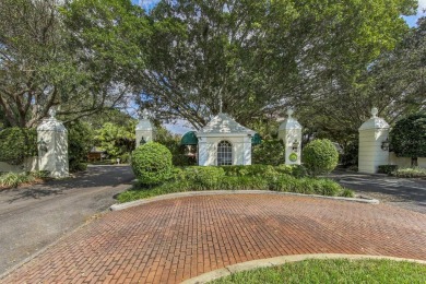 Experience casual lakefront luxury in this stunning residence on Boca Royale Golf and Country Club in Florida - for sale on GolfHomes.com, golf home, golf lot