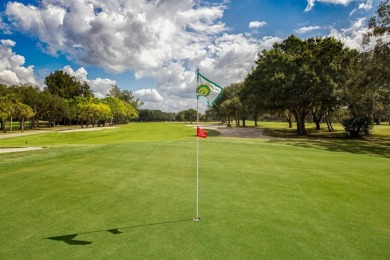 Experience casual lakefront luxury in this stunning residence on Boca Royale Golf and Country Club in Florida - for sale on GolfHomes.com, golf home, golf lot