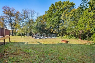 Discover the perfect mix of comfort, space, and country charm in on Fayetteville Country Club in Arkansas - for sale on GolfHomes.com, golf home, golf lot