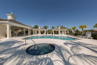 Experience casual lakefront luxury in this stunning residence on Boca Royale Golf and Country Club in Florida - for sale on GolfHomes.com, golf home, golf lot