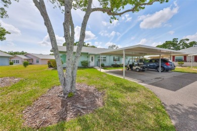 Located on a quiet cul-de-sac and just steps from the covered on Kings Point Executive Golf Course in Florida - for sale on GolfHomes.com, golf home, golf lot