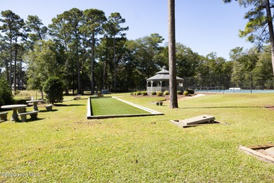 Located in the sought-after Lockwood Folly community, this on Lockwood Folly Country Club in North Carolina - for sale on GolfHomes.com, golf home, golf lot