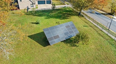 Discover the perfect mix of comfort, space, and country charm in on Fayetteville Country Club in Arkansas - for sale on GolfHomes.com, golf home, golf lot