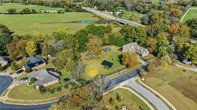 Discover the perfect mix of comfort, space, and country charm in on Fayetteville Country Club in Arkansas - for sale on GolfHomes.com, golf home, golf lot