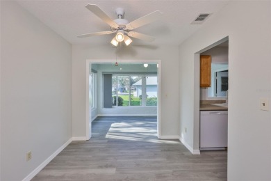 Located on a quiet cul-de-sac and just steps from the covered on Kings Point Executive Golf Course in Florida - for sale on GolfHomes.com, golf home, golf lot