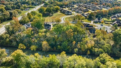 Discover the perfect mix of comfort, space, and country charm in on Fayetteville Country Club in Arkansas - for sale on GolfHomes.com, golf home, golf lot