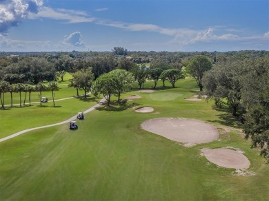 Experience casual lakefront luxury in this stunning residence on Boca Royale Golf and Country Club in Florida - for sale on GolfHomes.com, golf home, golf lot