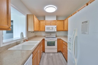 Located on a quiet cul-de-sac and just steps from the covered on Kings Point Executive Golf Course in Florida - for sale on GolfHomes.com, golf home, golf lot