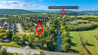 Discover the perfect mix of comfort, space, and country charm in on Fayetteville Country Club in Arkansas - for sale on GolfHomes.com, golf home, golf lot