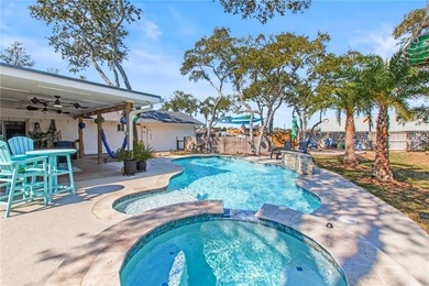 Beautifully updated and ideally located, this Harbor Oaks home on Rockport Country Club in Texas - for sale on GolfHomes.com, golf home, golf lot