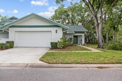BEAUTIFUL SECLUDED WOODRIDGE GREEN VILLA in prestigious East on East Lake Woodlands Country Club in Florida - for sale on GolfHomes.com, golf home, golf lot