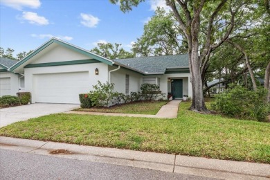 BEAUTIFUL SECLUDED WOODRIDGE GREEN VILLA in prestigious East on East Lake Woodlands Country Club in Florida - for sale on GolfHomes.com, golf home, golf lot
