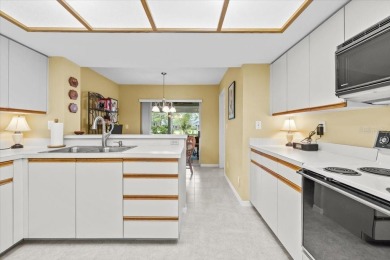 BEAUTIFUL SECLUDED WOODRIDGE GREEN VILLA in prestigious East on East Lake Woodlands Country Club in Florida - for sale on GolfHomes.com, golf home, golf lot
