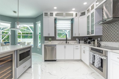 Completely Renovated Pool Home in Madison Green!This 4-bedroom on The Links At Madison Green in Florida - for sale on GolfHomes.com, golf home, golf lot