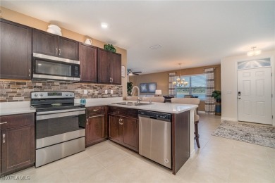TURNKEY with golf cart included ~ A MUST SEE!  Imagine waking up on Herons Glen Golf and Country Club in Florida - for sale on GolfHomes.com, golf home, golf lot