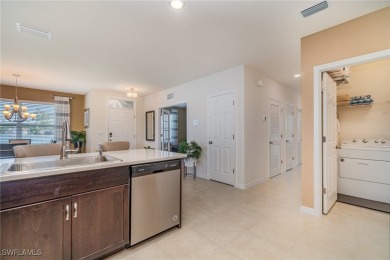 TURNKEY with golf cart included ~ A MUST SEE!  Imagine waking up on Herons Glen Golf and Country Club in Florida - for sale on GolfHomes.com, golf home, golf lot