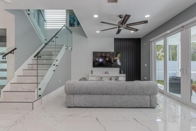 Completely Renovated Pool Home in Madison Green!This 4-bedroom on The Links At Madison Green in Florida - for sale on GolfHomes.com, golf home, golf lot