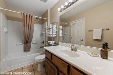 Welcome to your dream retreat! This stunning 3 bed, 2 bath top on The Oasis Golf Club in Nevada - for sale on GolfHomes.com, golf home, golf lot